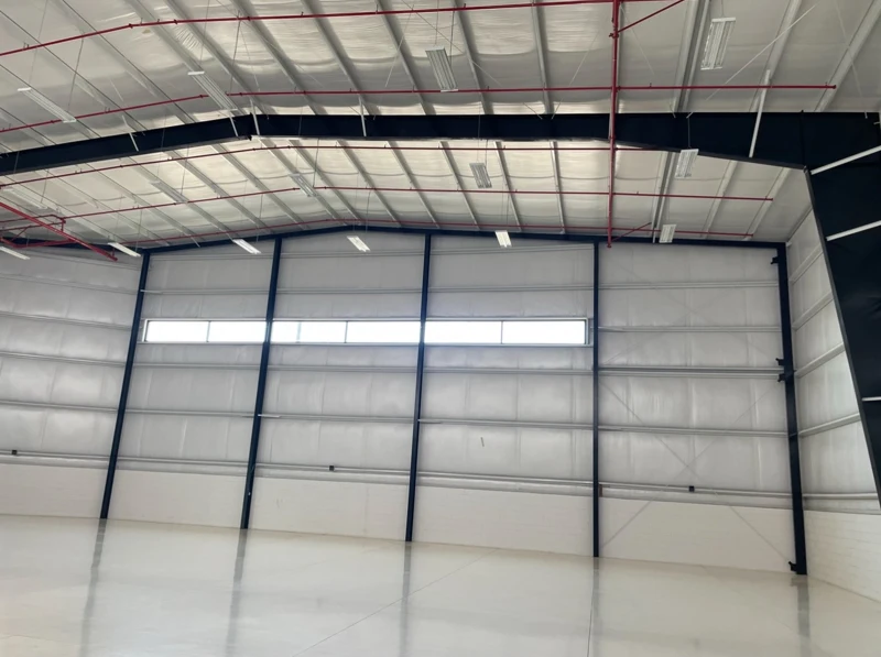 Steel metal building construction for warehouses and large span structures