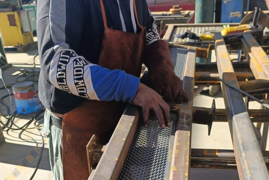 Professional welding services being performed on steel components during custom fabrication